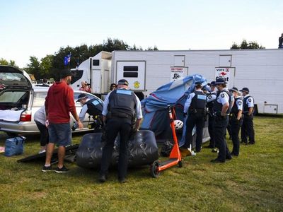 Loaded rifle seized from protester's car