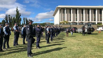 Man with rifle arrested as police clear campsite set up by Convoy to Canberra protesters opposing vaccine mandates