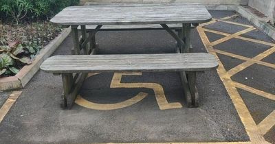 Fury as school uses disabled parking space for bench 'so teachers can eat lunch'