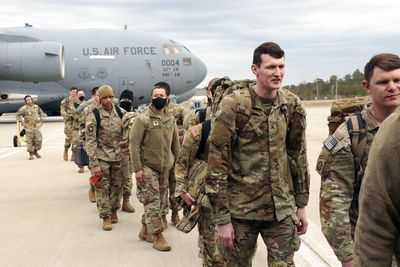 Ukraine latest updates: US troops arrive in Germany