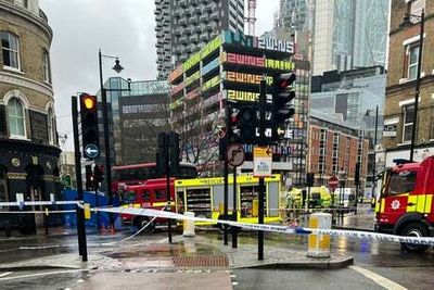 Woman killed after being hit by London bus in Shoreditch