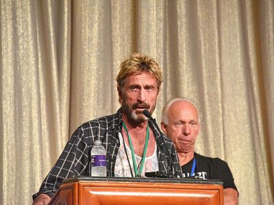 Why Prominent Bitcoin Backer John McAfee's Body Hasn't Been Laid To Rest, Months After Death