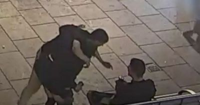 Killers swig from cans and hug near site of deadly attack