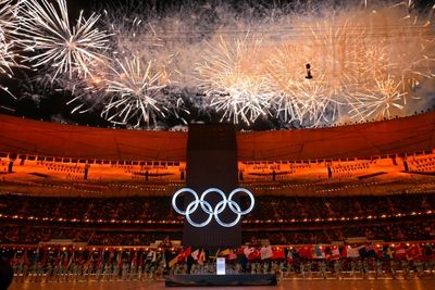 Beijing exults in Games' return, but many merely shrug