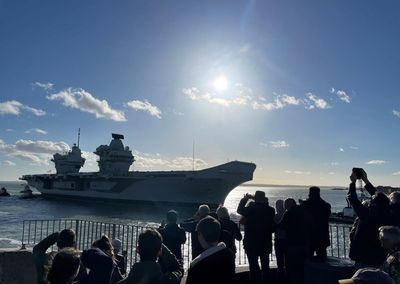 Royal Navy aircraft carrier returns to Portsmouth home base