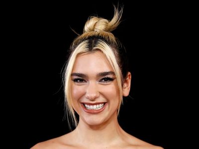 Dua Lipa poses thoughtful question on faith to Colbert. Fans were inspired by his answer.