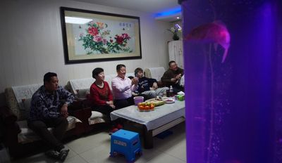 Beijing excited, dismisses controversy as Olympics begin