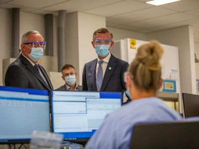 NSW posts 8389 virus cases, 18 deaths