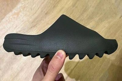 Kanye’s black Adidas Yeezy Slides are finally dropping next month