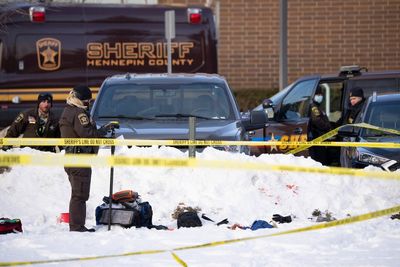 2 charged in fatal shooting at suburban Minneapolis school