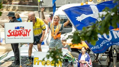 'Cloaked' far-right seizes on Canberra anti-vaxx protests