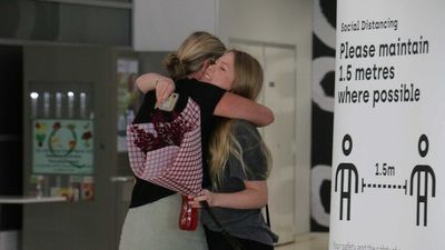 Beyond today's happy reunions, opinion remains divided on WA's border stance