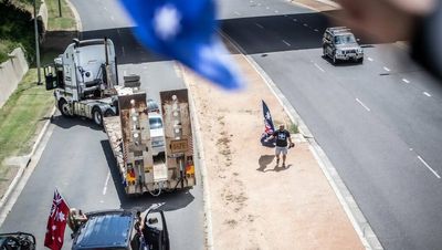 Truck driver blocks traffic as protesters gather outside Parliament House