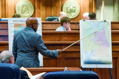 Justices weigh Alabama's bid to stop redistricting order