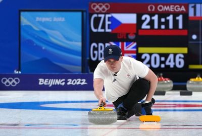 Bruce Mouat’s magic hat sweeps Great Britain closer to mixed curling medal match