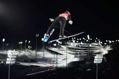 AP PHOTOS: Medals and more at Day 1 of the Beijing Olympics