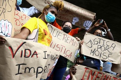 Protests against murder of Congolese immigrant focus on racism in Brazil