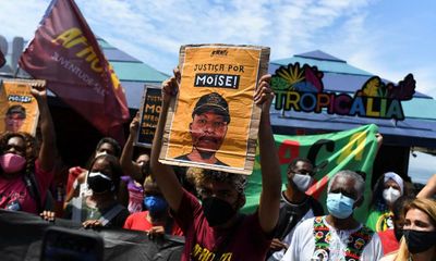 Anti-racism protesters march in Brazil after refugee murdered in Rio