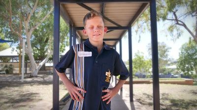 No obstacle too much as vision impaired Christopher McLeod-Barrett, 12, tackles first day of high school in rural Queensland