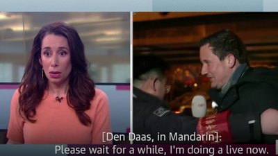 Watch The Moment A Journo Gets Dragged Away Live On Air By A Beijing Olympics Security Guard