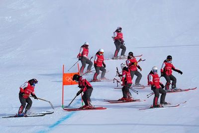 Olympics Live: Men's downhill postponed due to high winds
