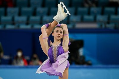 Russian teen rules rink in dazzling Olympic figure skating debut