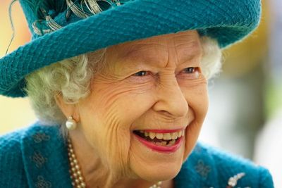 Queen pictured working in new image released for 70-year milestone