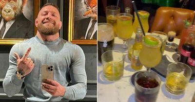 Conor McGregor has fans worried as he shows off pub table with dozens of drinks