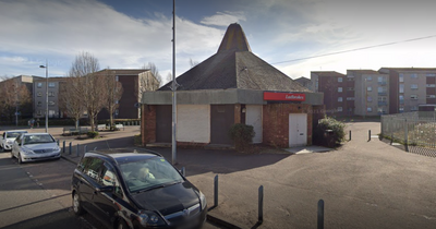 'Gunman' threatens staff at Scots bookies before making off with three figure sum