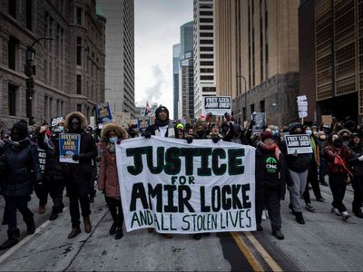 Hundreds protest in Minneapolis after police killing of Black man during ‘no-knock’ raid