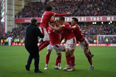 Man arrested after pitch invader punches players during FA Cup tie