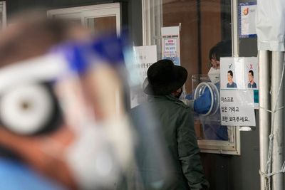 Omicron forces S. Korea to end GPS monitoring, some checkups