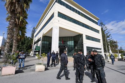 Tunisia police lock doors of legal body, stop staff from entering