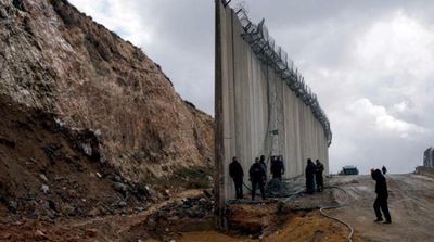 Parts of Israel's Separation Wall Collapse