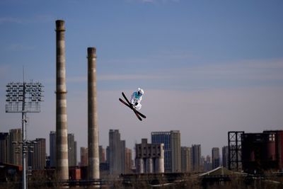 Closed steel mill sends Olympic skiers - not smoke - skyward