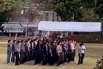 Four students arrested for campus gun salute