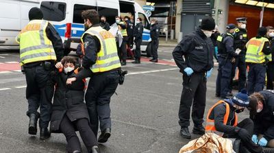 Group of 11 Climate Activists Glue Themselves to Berlin Motorway