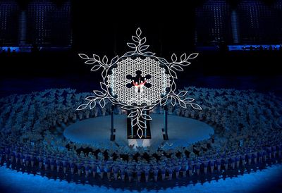 Olympics-China's U.N. envoy says choice of Uyghur torchbearer not meant to deflect Western criticism