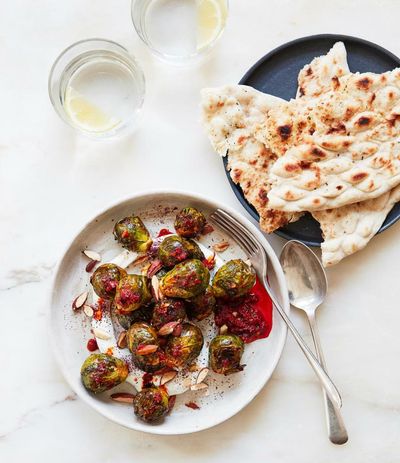 Thomasina Miers’ recipe for harissa roast sprouts with lemon-tahini yoghurt