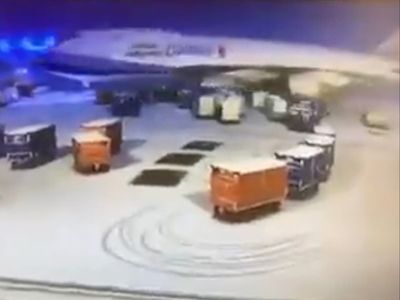 Video shows baggage cart sucked into plane engine at Chicago O’Hare International