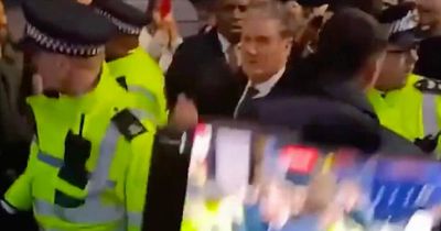 Keir Starmer rescued by police after being mobbed by anti-vaxxers shouting Savile slurs