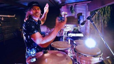 Drummer opposed to vaccine mandates gets the jab after coming down with COVID