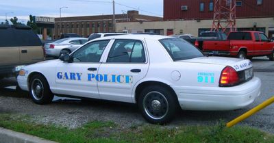 Suspect arrested after Gary police officer is shot in the shoulder