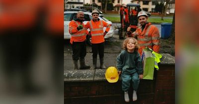 Boy, three, has day made when workmen knock on his door