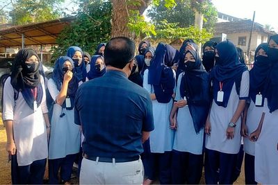 In India, wearing hijab bars some Muslim students from class