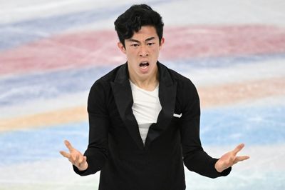 Chen smashes record with 'shocked' rival Hanyu in trouble in Beijing