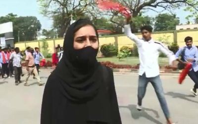 Hijab-clad student heckled by boys wearing saffron scarves in Mandya college