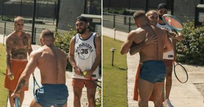 Fans stunned by Conor McGregor's physique as he meets Justin Bieber in Barbados