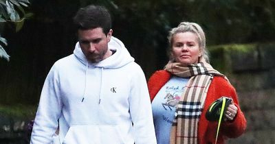 Kerry Katona takes new Rottweilers for a walk after terrifying robberies