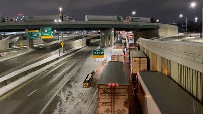 Angry Canada truckers block busiest bridge with U.S.; Trudeau faces grilling